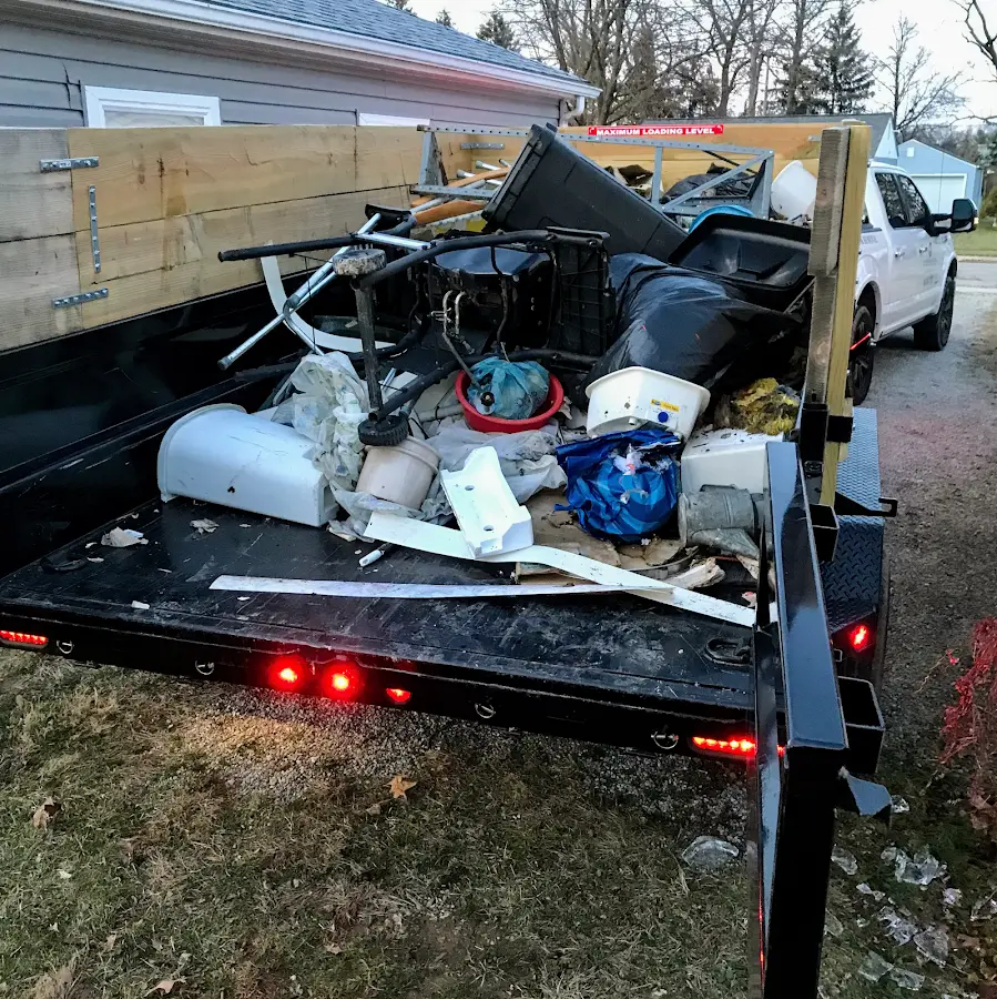 Roll-off dumpster delivered to a residential driveway in Ashburnham