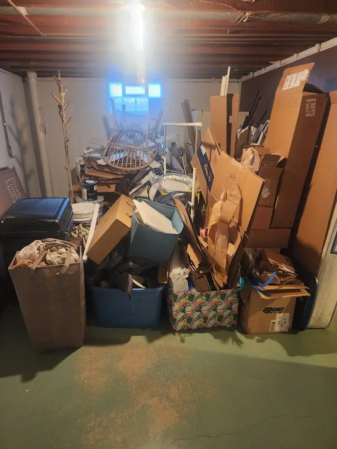 Roll-off dumpster container at job site for Concrete Dumpster Rental in Ashburnham